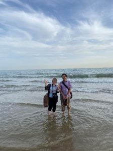 Sarah Pavey and Stephane Goldstein paddling in the sea