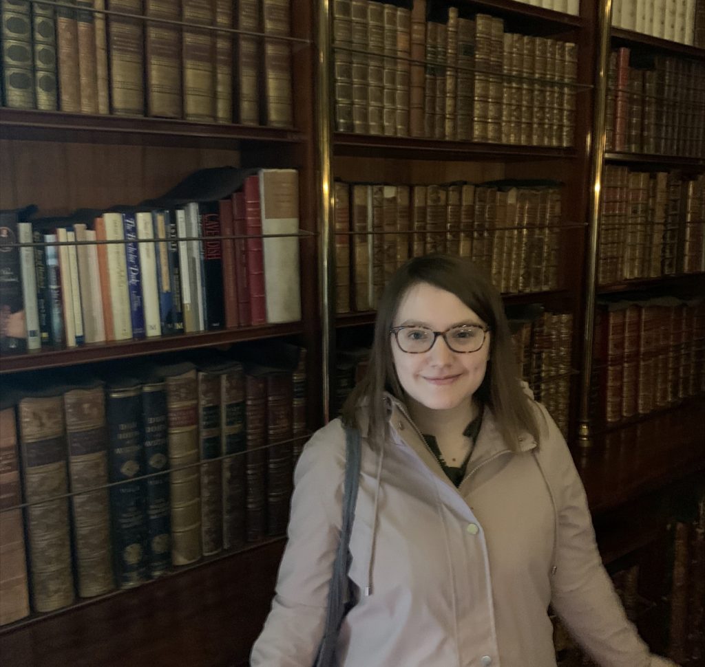 Image of Ella in a library