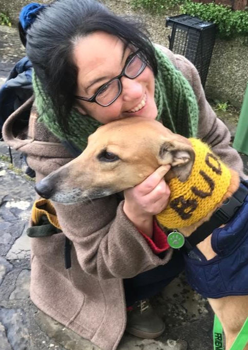 Kerrianne cuddles Bud the lurcher